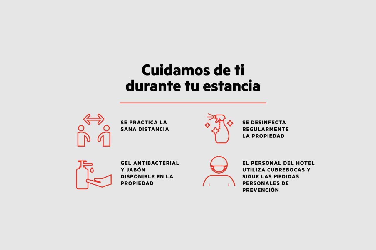 Capital O Cancun Ocean View, Cancun Bagian luar foto Safety measures at hotels in Spain