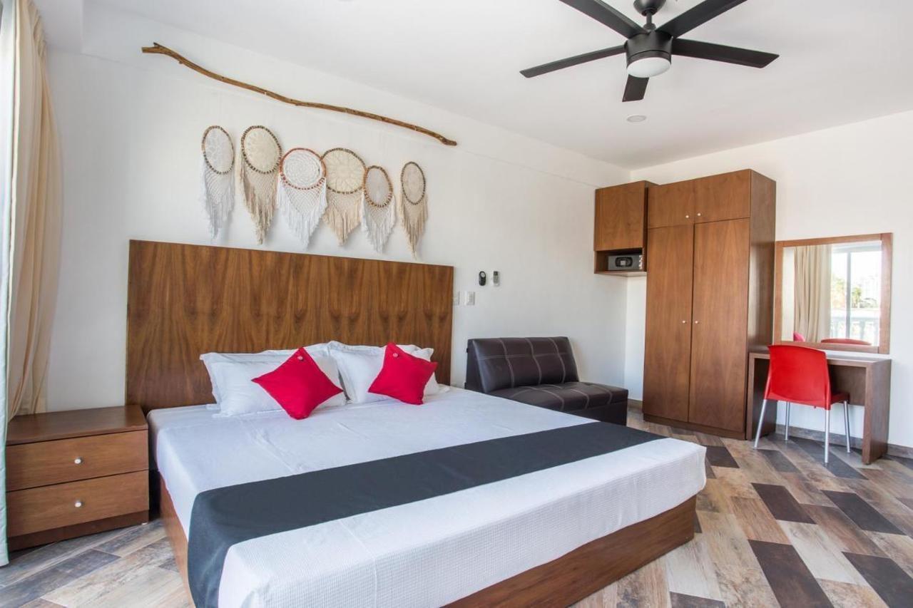Capital O Cancun Ocean View, Cancun Bagian luar foto A bedroom at the hotel