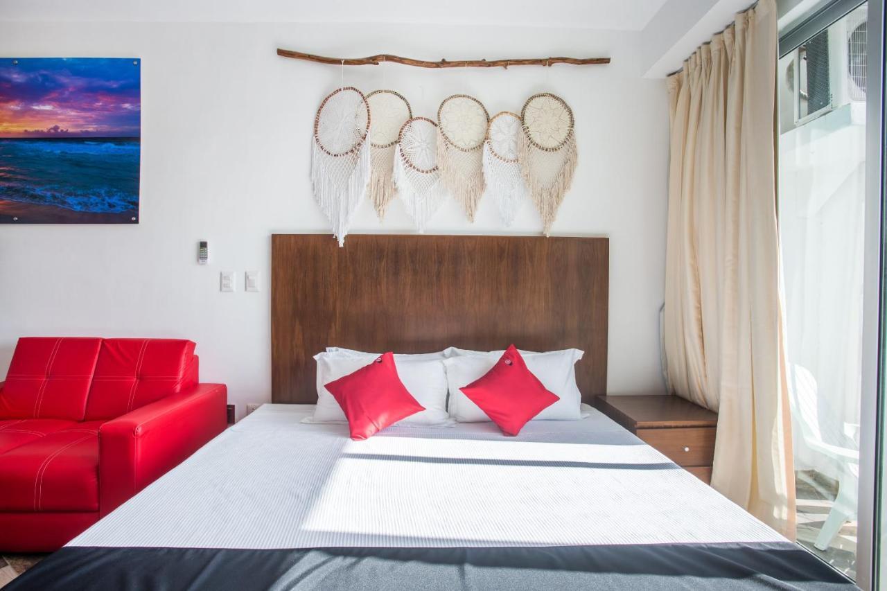 Capital O Cancun Ocean View, Cancun Bagian luar foto A bedroom at the hotel
