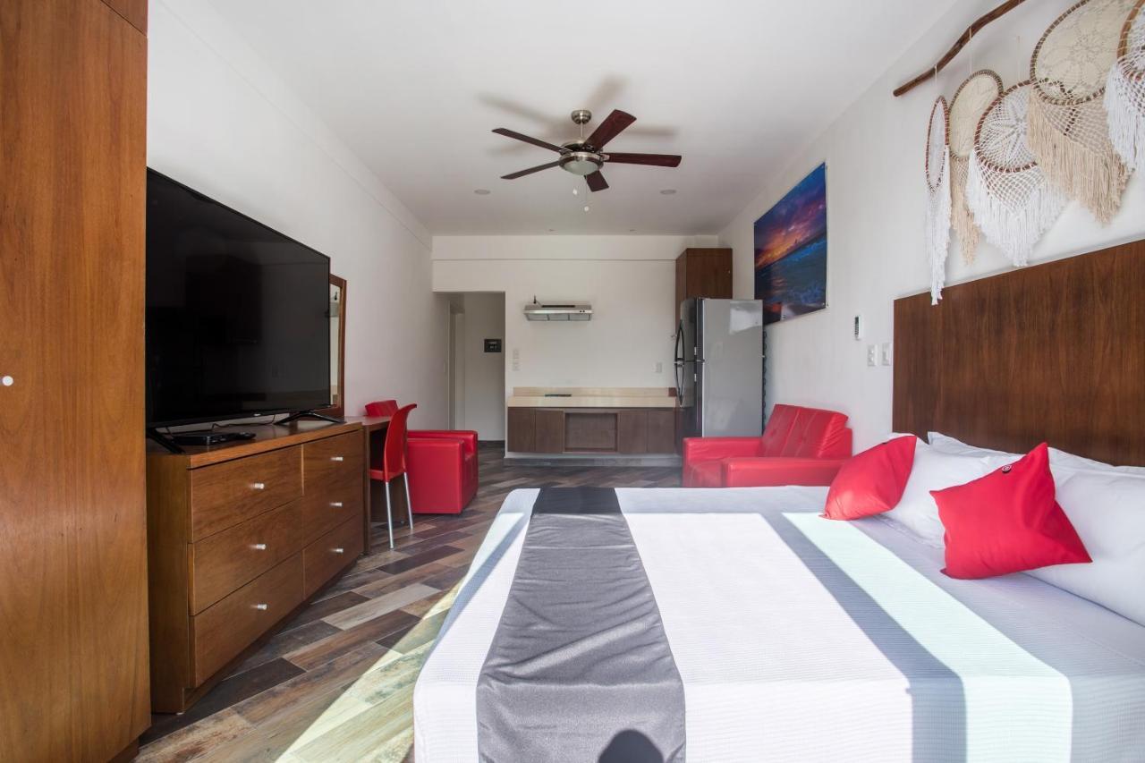 Capital O Cancun Ocean View, Cancun Bagian luar foto A room at the hotel